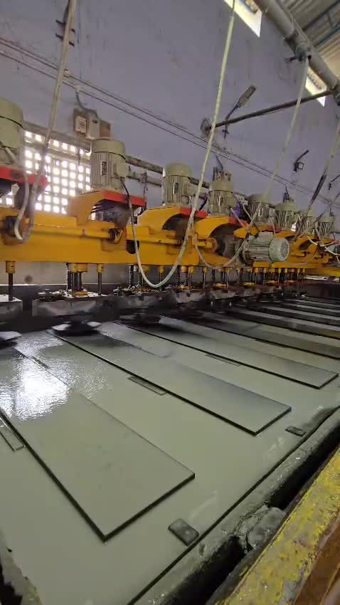 Granite processing machinery in the supplied factory video